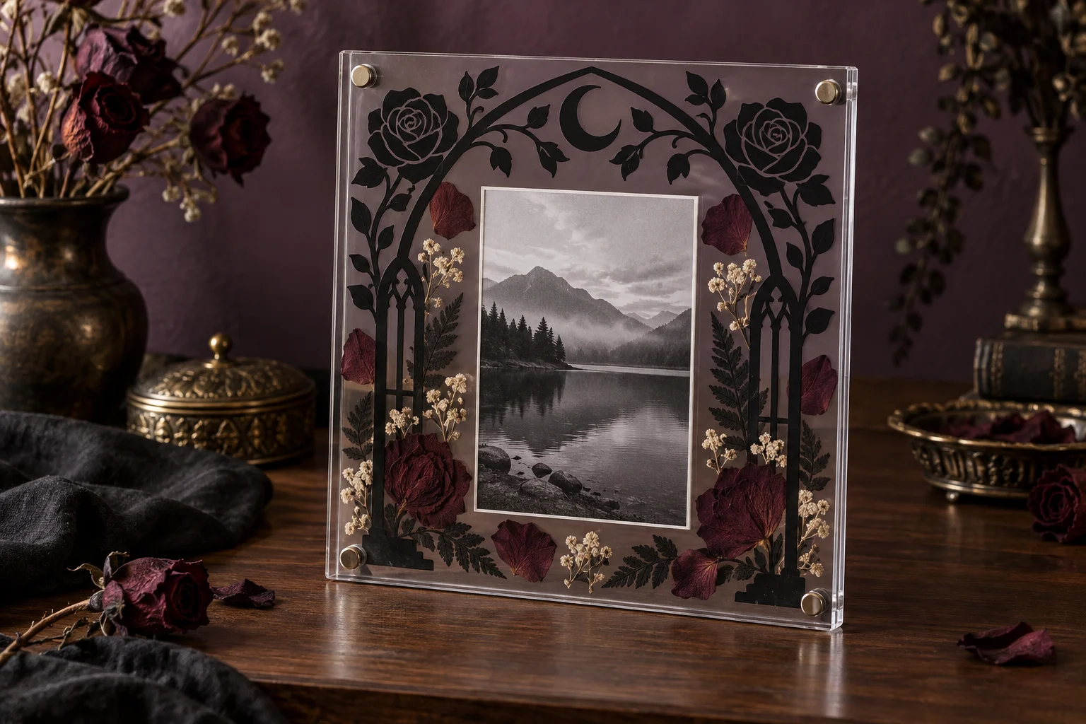 Finished clear acrylic photo frame with black gothic rose and cathedral-arch vinyl, burgundy pressed flowers, cream botanicals, and a black-and-white mountain photograph